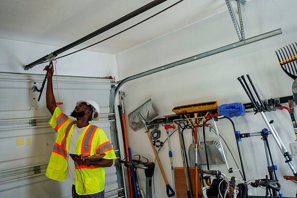 Professional Garage Door Panel Replacement technician working in Garfield County County, OK